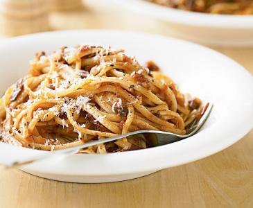 Bowl of linguine pasta with fork