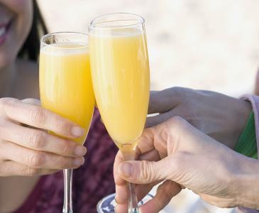 Mimosas in champagne flutes