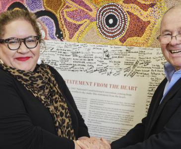 Prof Megan Davis and Neil Balnaves shaking hands