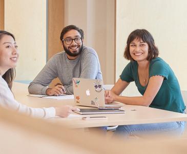 Students sitting around a table