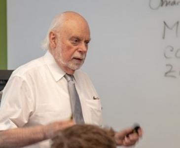 Sir Fraser Stoddart teaching in the classroom