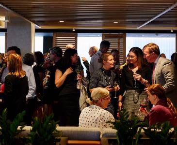 People mingling at The Lounge