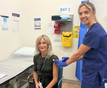 Nurse Shauna Cagney vaccinating Dr Shona Dutton, Director of Student Wellbeing & Sport, Pro Vice-Chancellor Student Success Office.