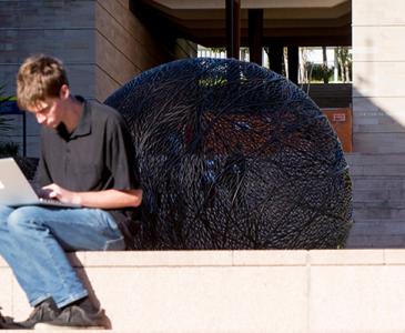 researcher on computer at UNSW