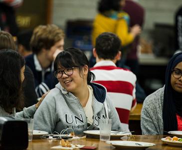 students enjoying pre dawn meals