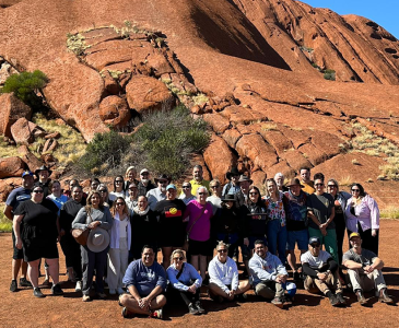 The 2023 EIELP cohort during an on-Country learning experience at Uluru