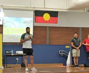 South Sydney's Greg Inglis speaks to a crowd of high school students in partnership with UNSW