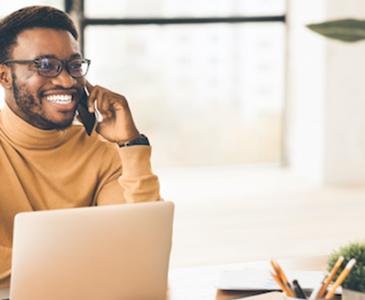 Man sitting at laptop