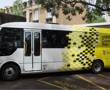 Shuttle bus with UNSW branding