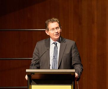 Professor Ian Jacobs speaking at an event