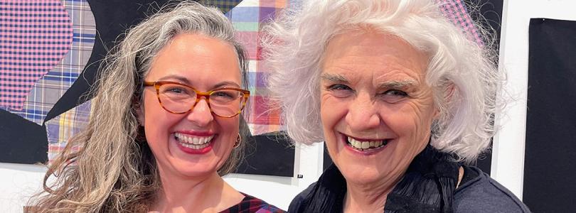 Two women Emma Peters and Liz Williamson smiling at the camera